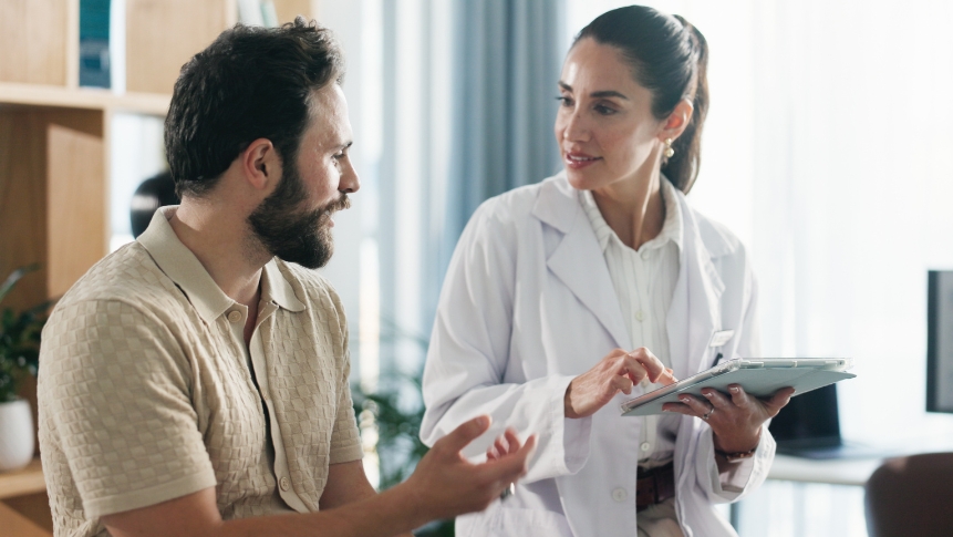Male patient consulting with a provider about men's aesthetic treatments at a physician-led med spa in The Colony TX